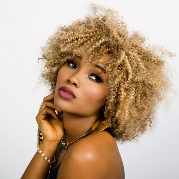 woman-face-curly-hair-157920